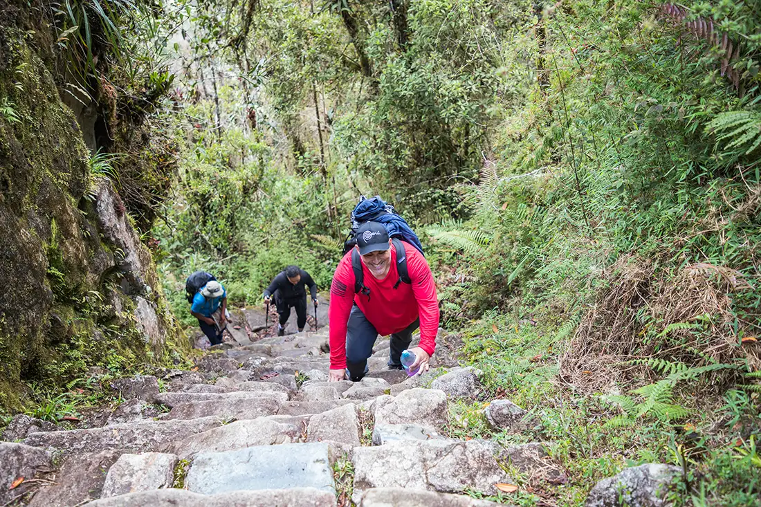 man climbing stais at the Inca Trail | TreXperience